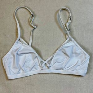 White bra with sheer mesh detailing. No padding no underwire. Bralette lingerie